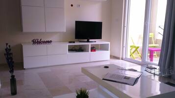 Standard Apartment, 2 Bedrooms | Living area | LCD TV