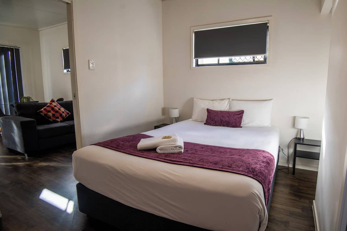 Cabana superior | Ferros/tábuas de passar roupa, roupa de cama