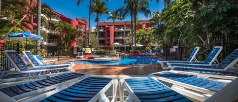 Outdoor pool, a heated pool, sun loungers