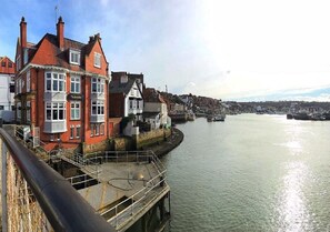 A waterfront building with a sign reading "The Dolphin." - The Dolphin (Whitby)