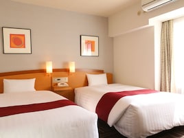Escrivaninha, cortinas blackout, Wi-Fi de cortesia, roupa de cama