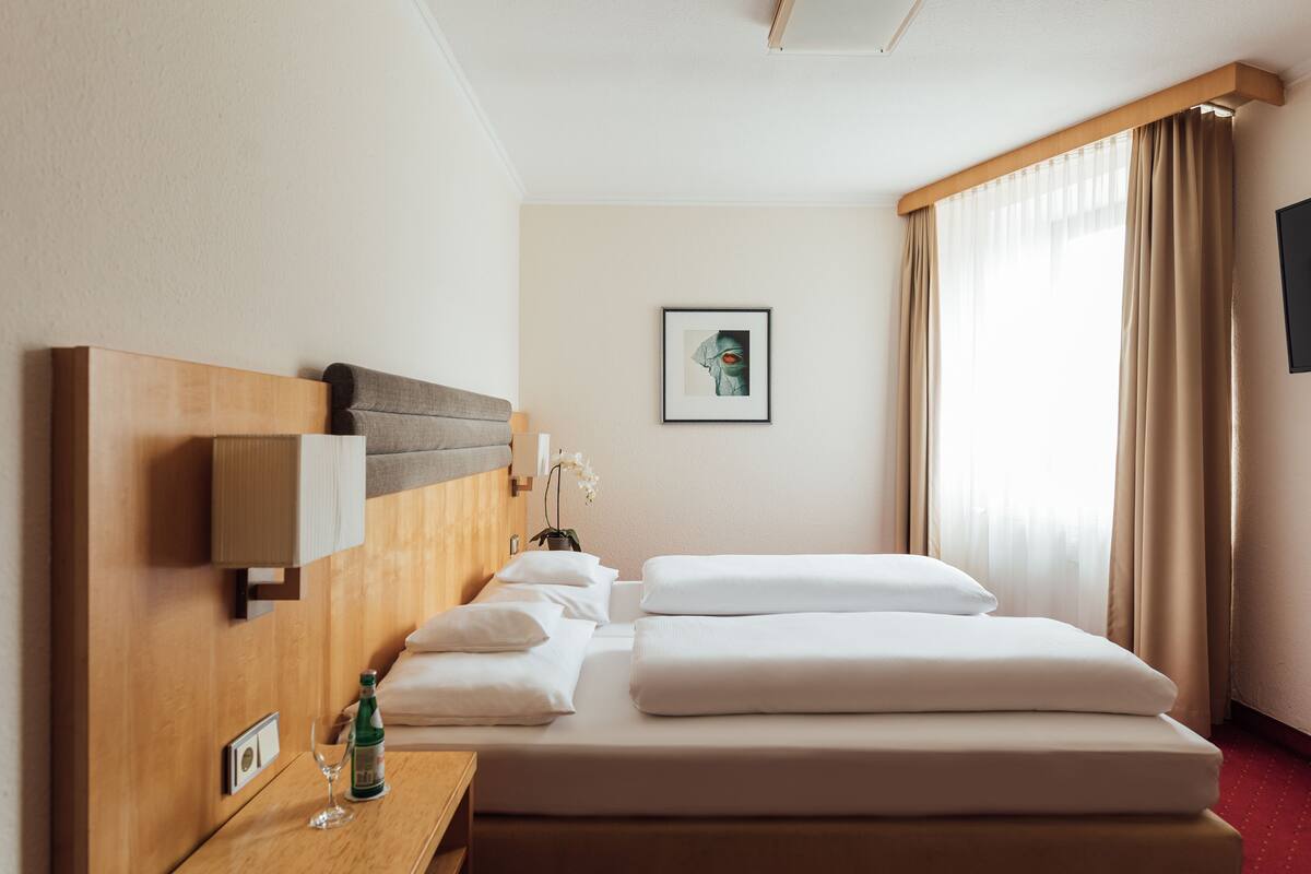 Hypo-allergenic bedding, down duvets, minibar, in-room safe