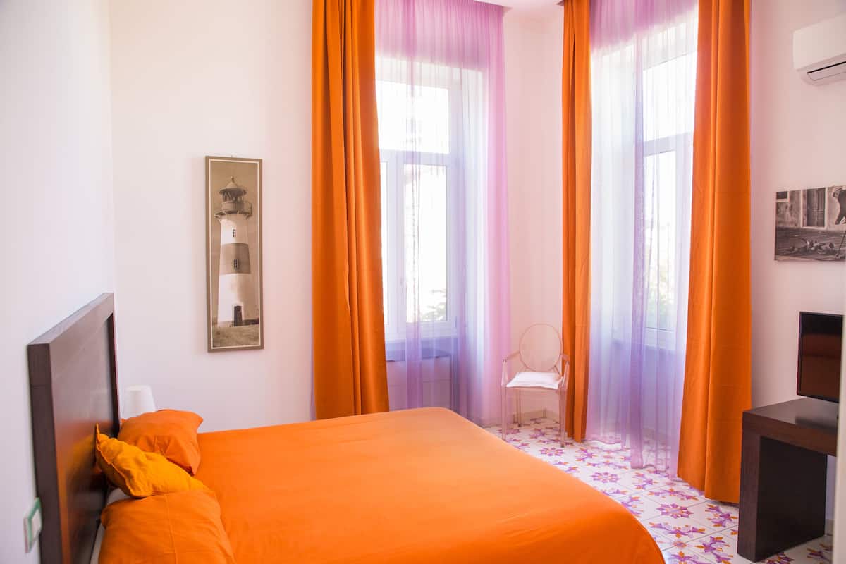 Room, 1 Bedroom, Sea View (L'Aulive) | 3 bedrooms, blackout drapes, iron/ironing board, free WiFi