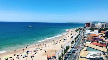 On the beach, sun-loungers, beach umbrellas, beach towels