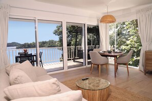 Premier Suite, 2 Bedrooms, Hot Tub, Sea Facing | Living area | Flat-screen TV - Bocas del Mar Hotel (Boca Chica)