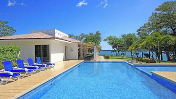 2 outdoor pools, pool umbrellas, pool loungers