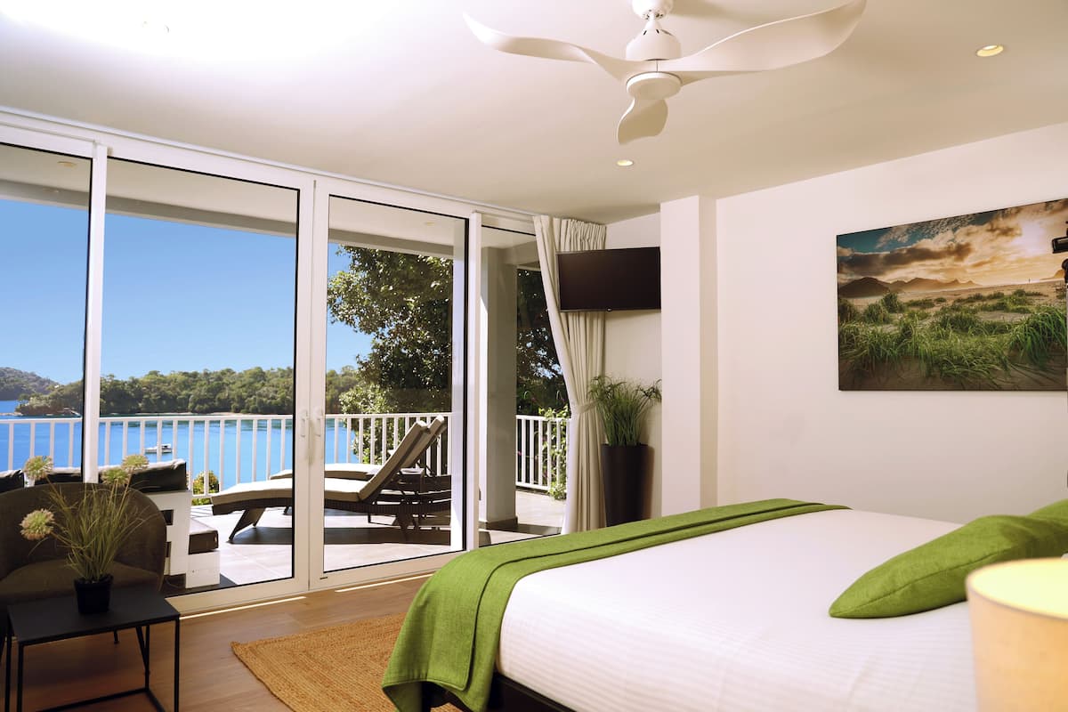 Premier Suite, 2 Bedrooms, Hot Tub, Sea Facing | In-room safe, desk, laptop workspace, blackout drapes
