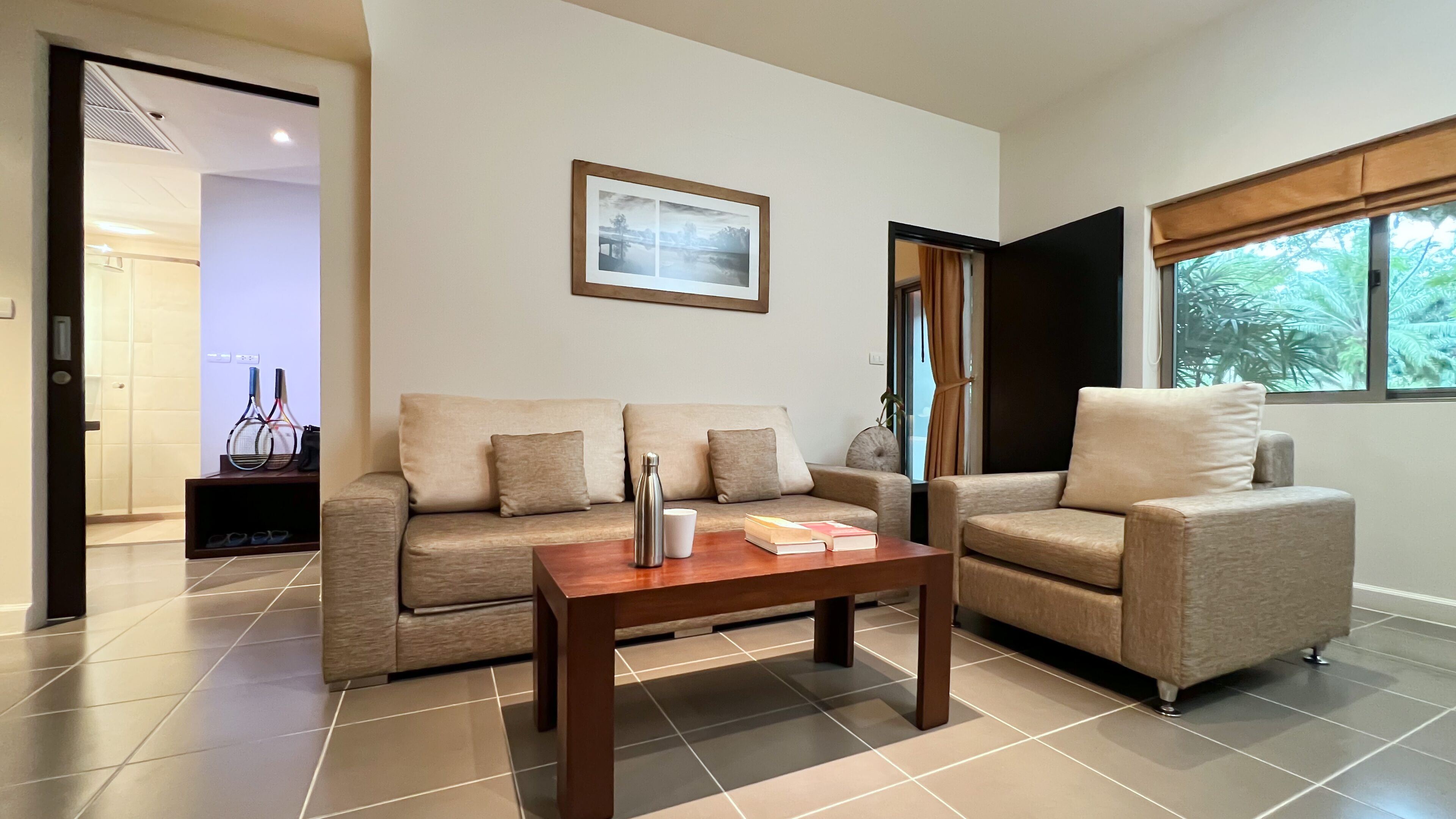 junior suite, 1 king bed (garden wing) | living area | flat-screen tv