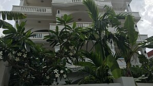 A multi-story building with balconies and a white exterior. - King Boutique Hotel (Siem Reap)