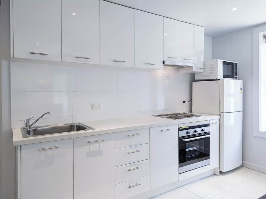 Two-Bedroom Superior Apartment | Private kitchen | Full-size fridge, microwave, oven, stovetop