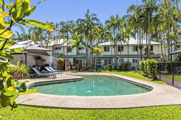 Outdoor pool, a heated pool, pool umbrellas, pool loungers