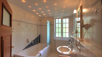 Deep-soaking bathtub, free toiletries, hair dryer, bathrobes