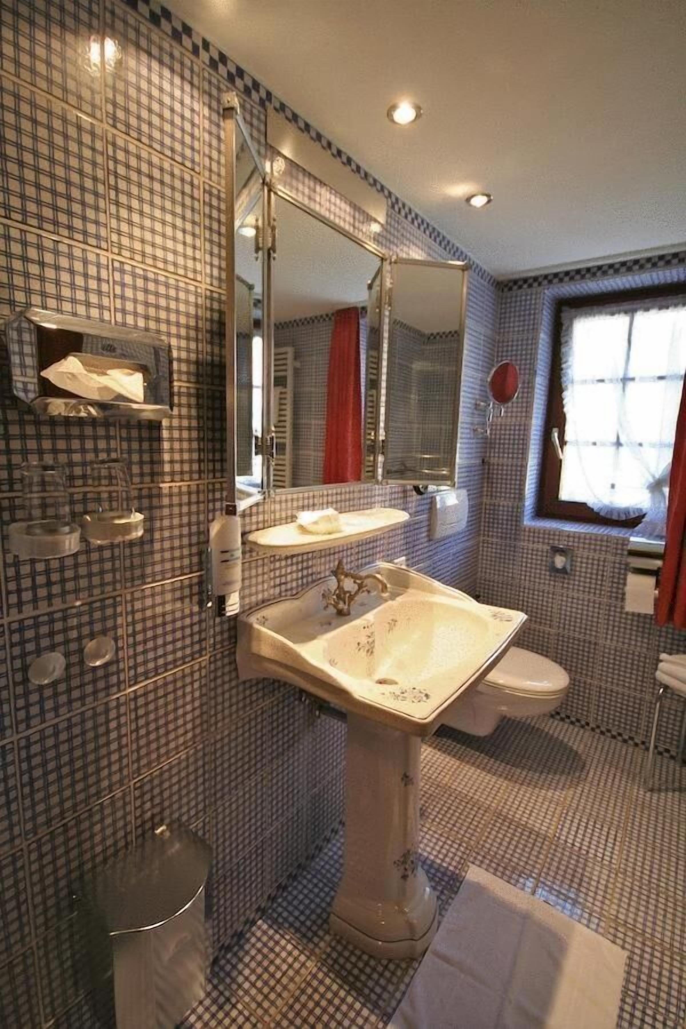 deep-soaking bathtub, free toiletries, hair dryer, bathrobes