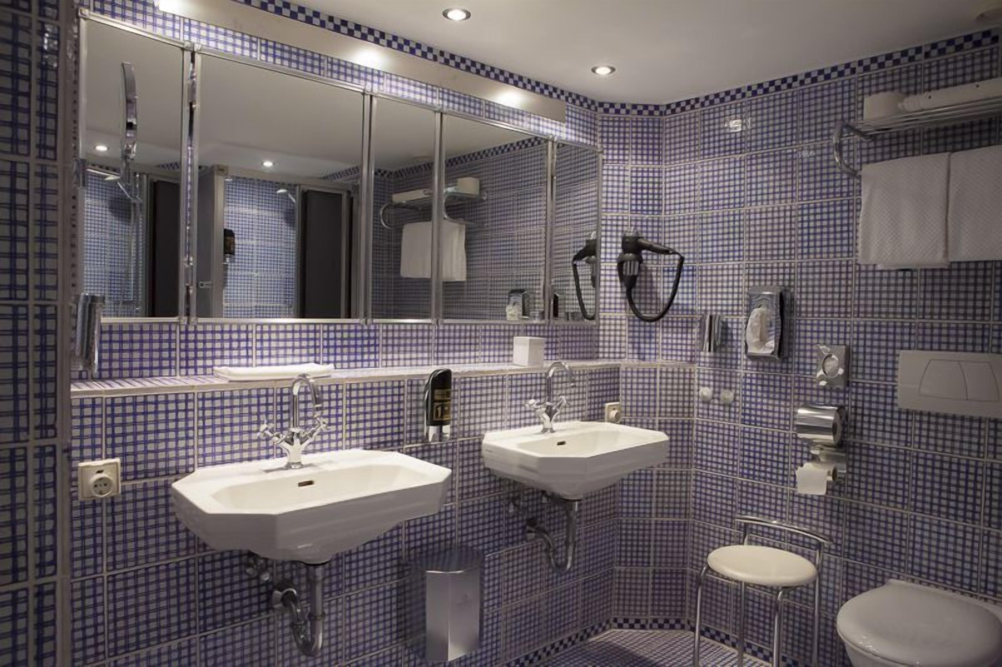 deep-soaking bathtub, free toiletries, hair dryer, bathrobes