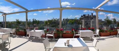 Breakfast, lunch, dinner served; international cuisine, garden views