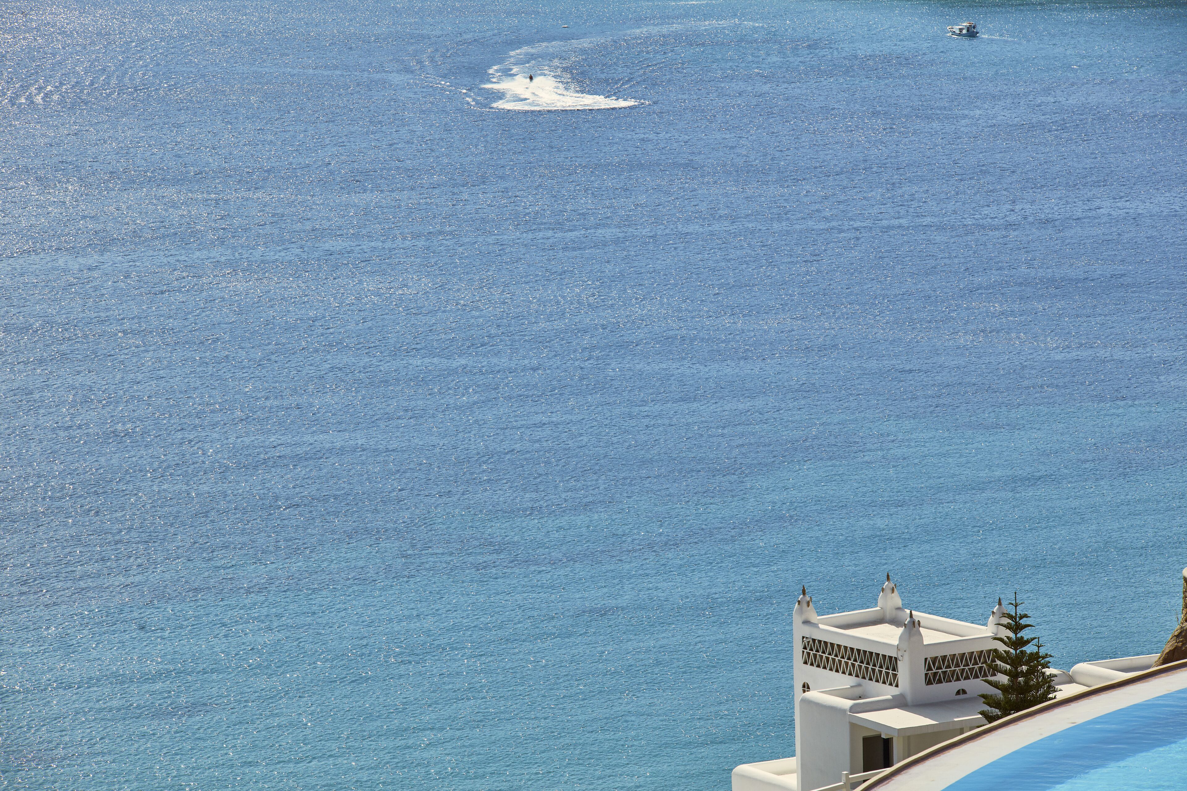 private beach, free beach shuttle, sun-loungers, beach umbrellas