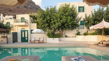 Outdoor pool, open 8:30 AM to 6:30 PM, pool umbrellas, sun loungers