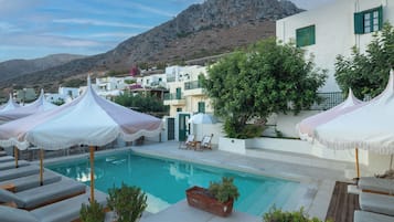 Outdoor pool, open 8:30 AM to 6:30 PM, pool umbrellas, sun loungers
