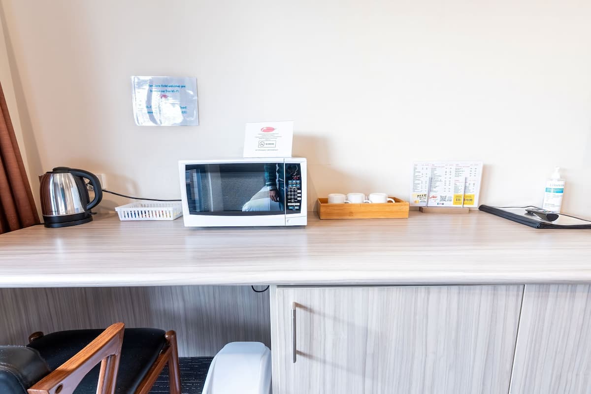 superior queen + single suite | in-room safe, desk, laptop workspace, blackout curtains