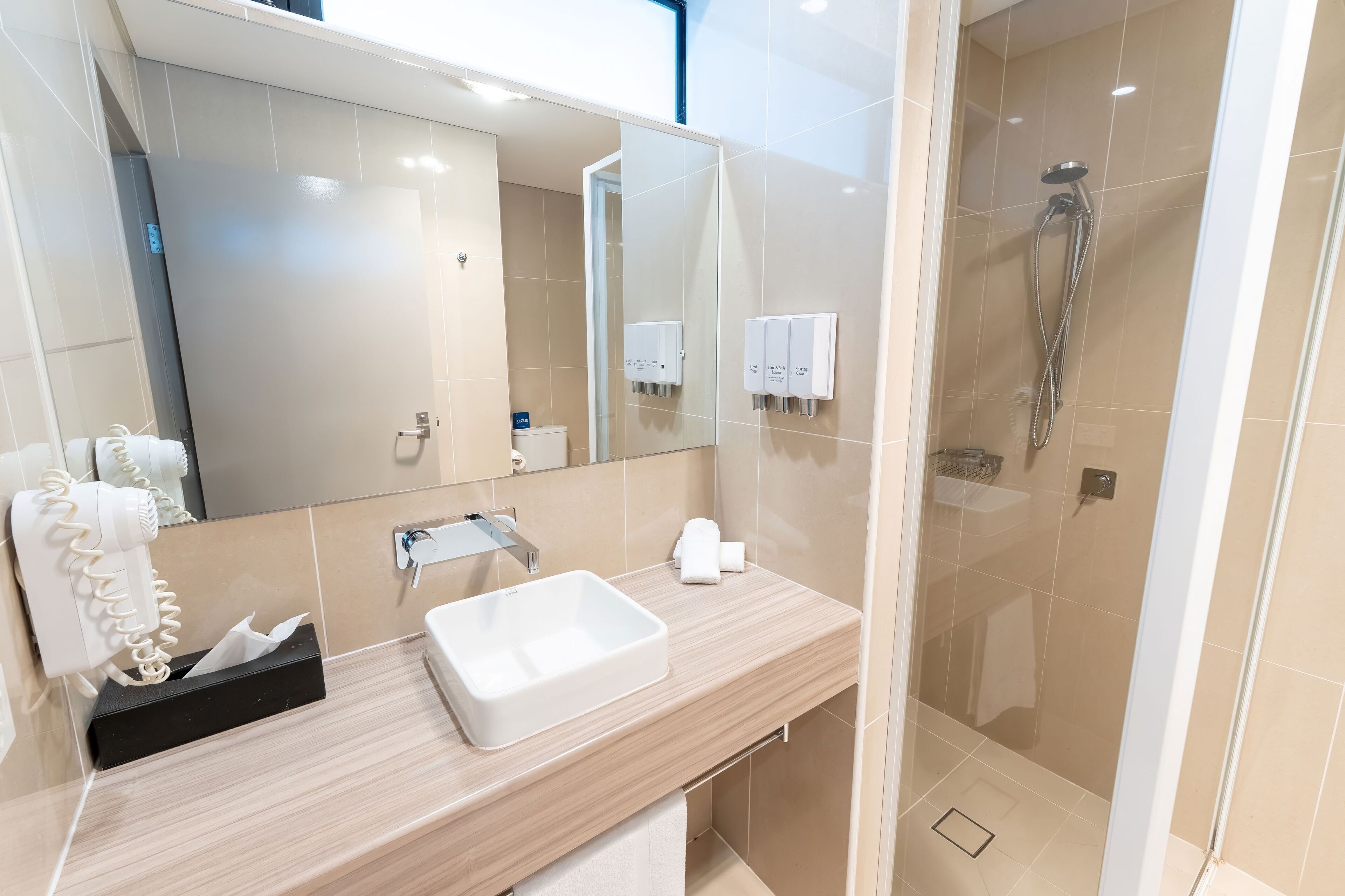 superior queen + single suite | bathroom | shower, free toiletries, hair dryer, towels