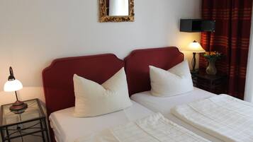 Luxe beddengoed, een kluis op de kamer, een bureau