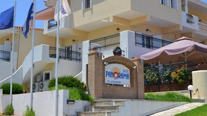 A hotel sign with the name "PANORAMA" and contact information. - Hotel Panorama (Monemvasia)