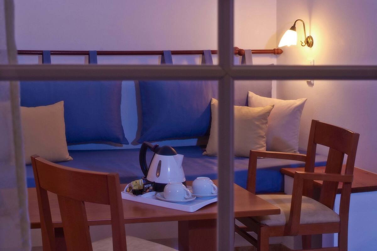 suite sea view for 2 people | living area | tv