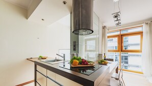 Business Apartment, 1 Bedroom | Private kitchen | Full-size fridge, oven, electric kettle, cookware/dishes/utensils - P&O Apartments Arkadia (Warsaw)