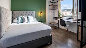 2 habitaciones, minibar, escritorio y cortinas blackout