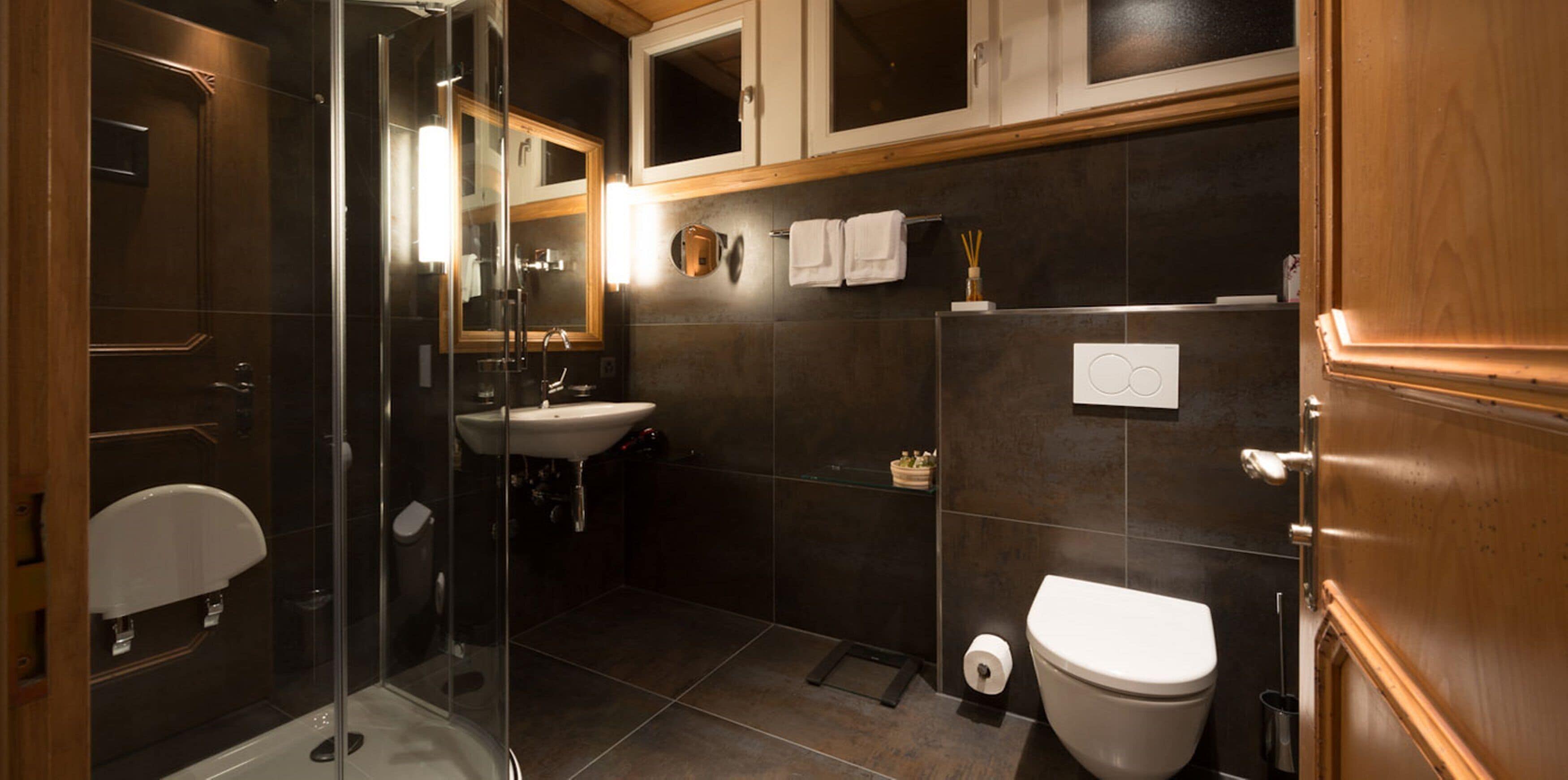 deluxe double room | bathroom | free toiletries, hair dryer, slippers, towels