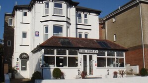 A two-story building with a sign reading "THE FAWLEY" at the entrance. - The Fawley (Shanklin)