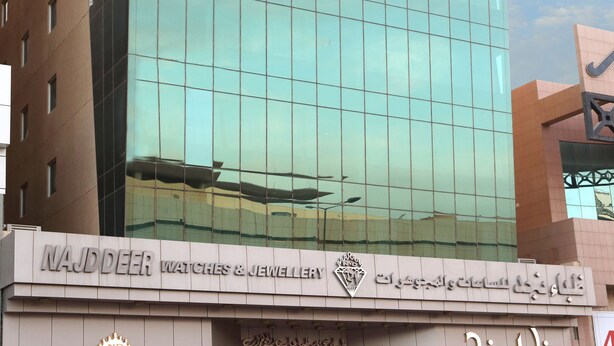 A modern hotel with a glass facade and a prominent sign for the ibis hotel. - Ibis Riyadh Hotel Al Muhammadiyah United Company Branch (Riyadh)