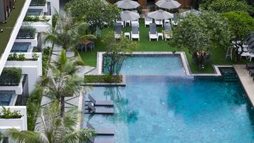 Outdoor pool, pool umbrellas, pool loungers