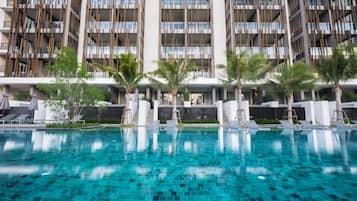 Outdoor pool, pool umbrellas, sun loungers