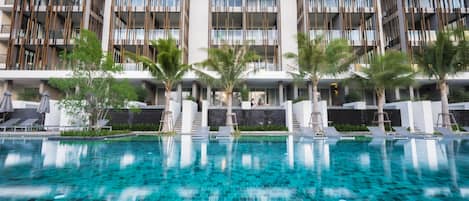 Outdoor pool, pool umbrellas, sun loungers