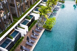 Outdoor pool, pool umbrellas, sun loungers