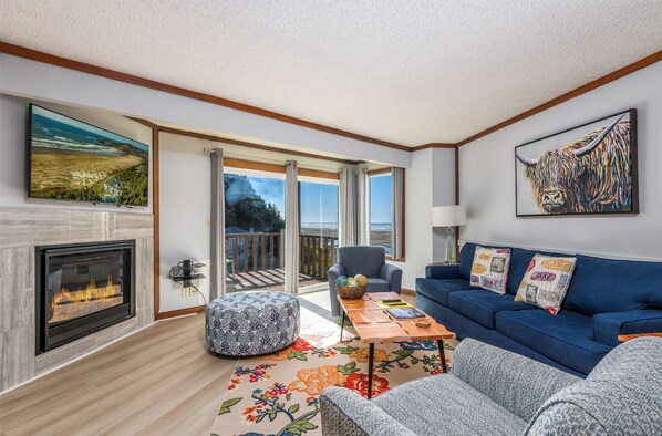 Condo, 1 quarto, para não fumantes | Área de estar | TV LED 65 polegadas com canais a cabo, TV, lareira