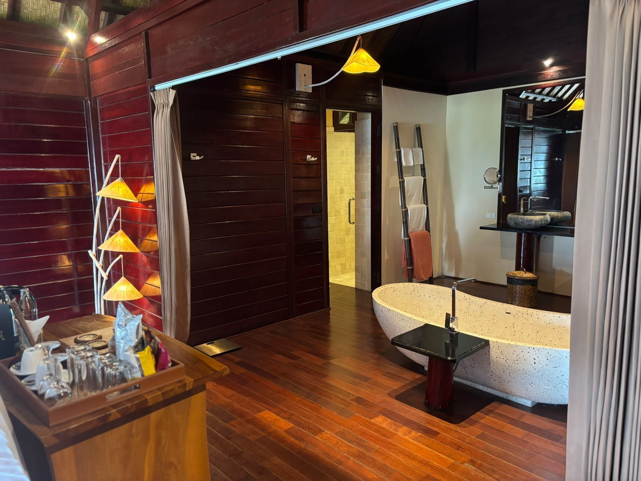 designer toiletries, hair dryer, bathrobes, slippers