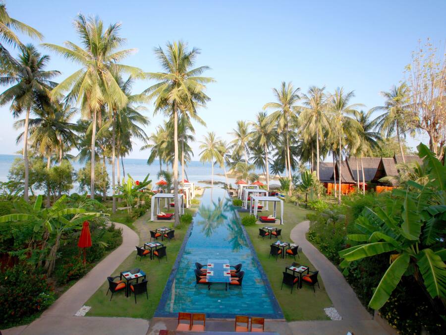 Outdoor pool, open 7:00 AM to 7:00 PM, pool umbrellas, pool loungers