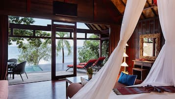 Deluxe Beachfront Pool Villa | Minibar, in-room safe, individually decorated, individually furnished