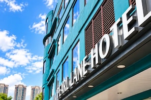 A modern building with the sign 'Pearl Line Hotel' indicating a hotel establishment. - Pearl Lane Hotel (Manila)