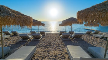 Private beach, sun loungers, beach umbrellas, beach towels