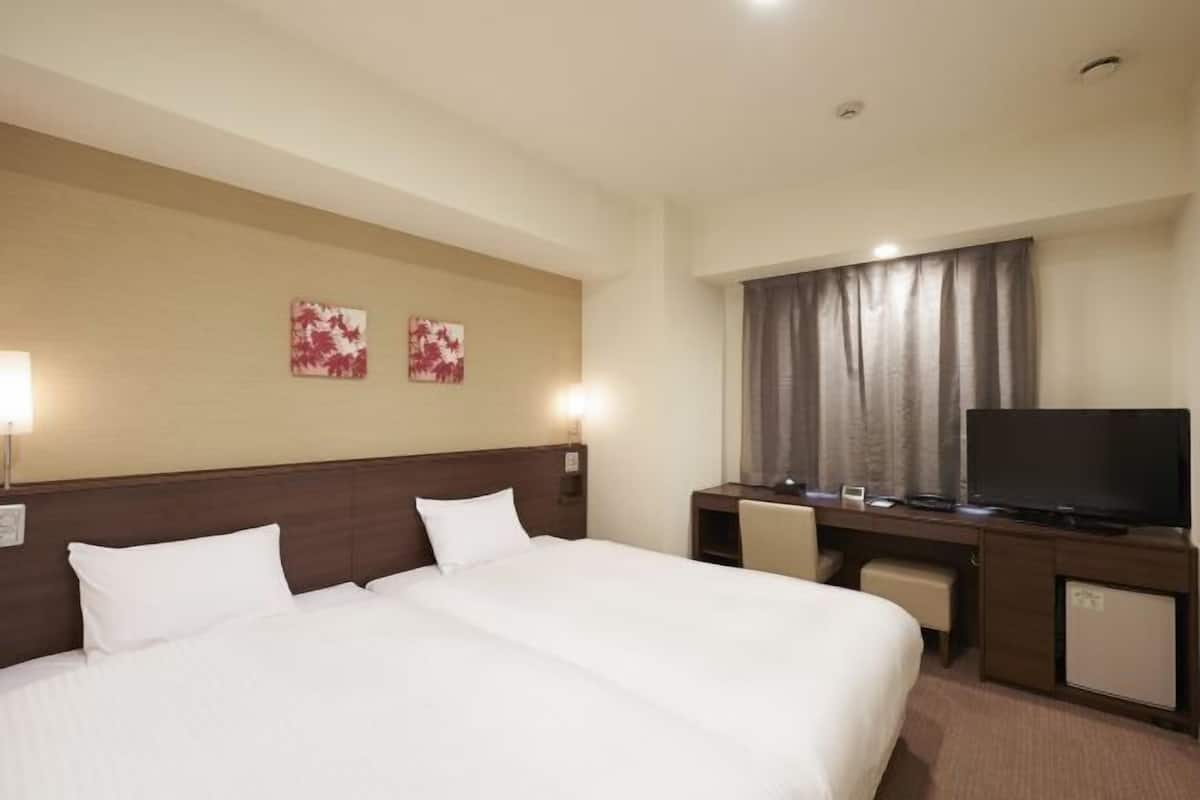 Down duvets, desk, blackout curtains, free WiFi
