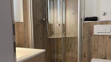 Shower, free toiletries, hair dryer, towels