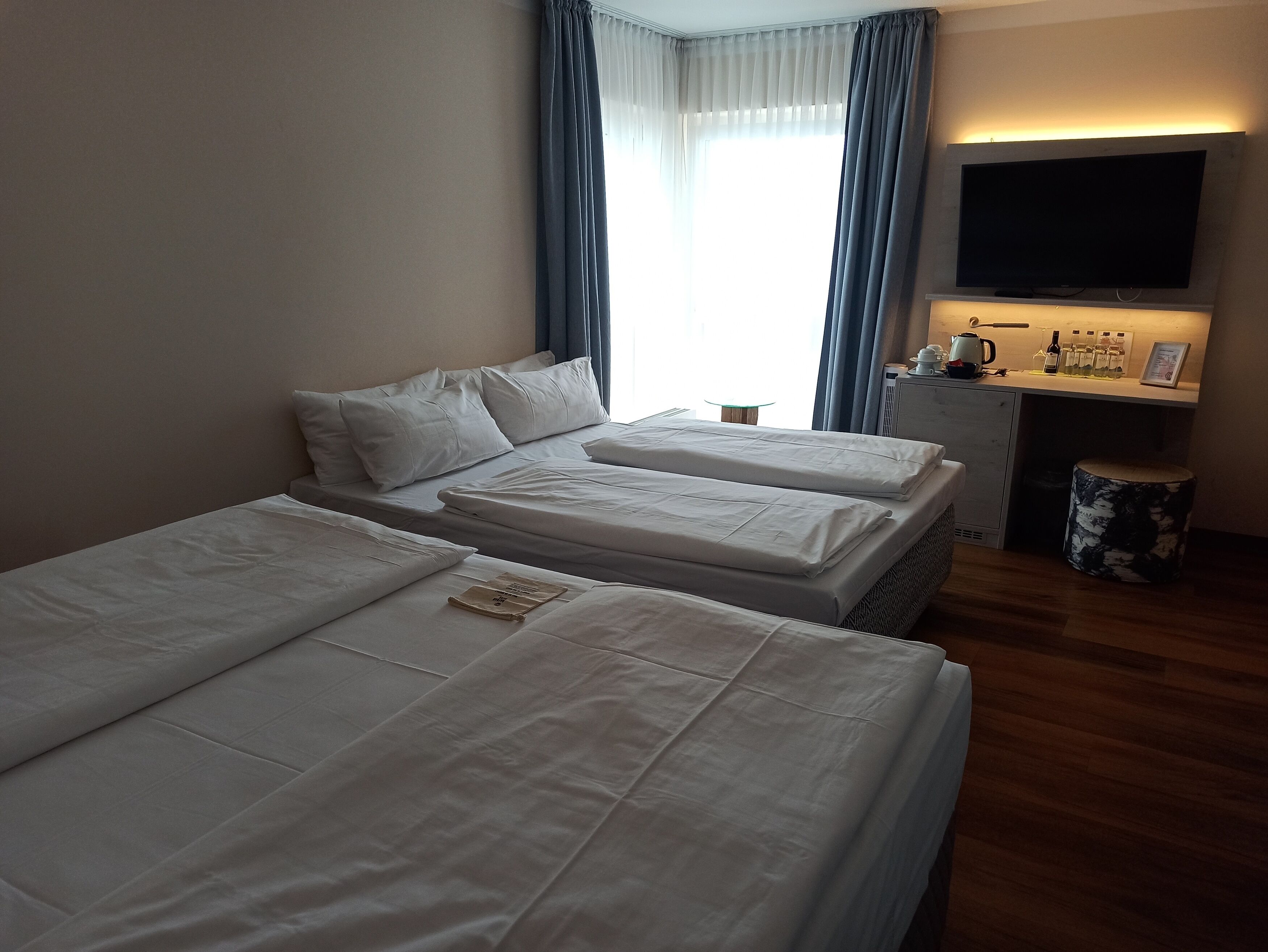 quadruple room | hypo-allergenic bedding, down duvets, minibar, desk