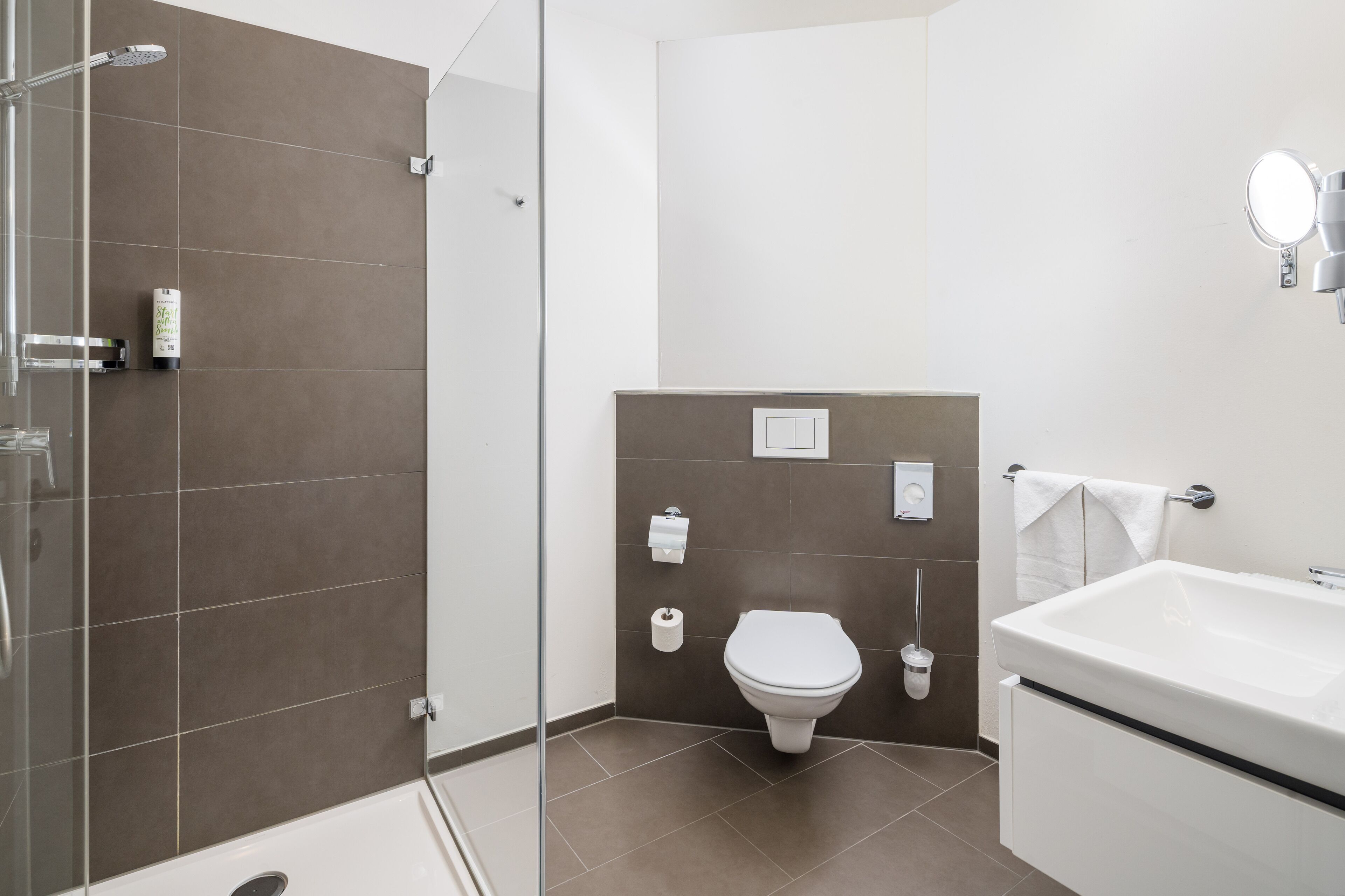 shower, eco-friendly toiletries, hair dryer, towels