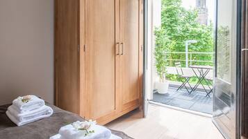 Apartment, 1 Bedroom | Laptop workspace, iron/ironing board, free WiFi, bed sheets