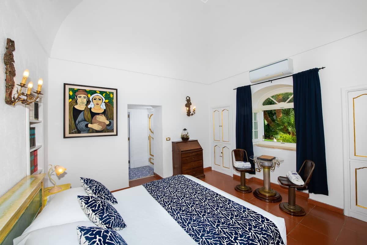 Habitación básica doble (San Juan Garden View) | 1 dormitorio y colchones con acolchado adicional