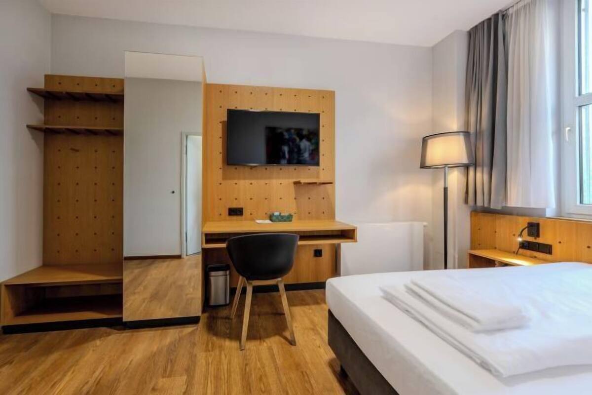 Premium bedding, pillowtop beds, desk, blackout drapes