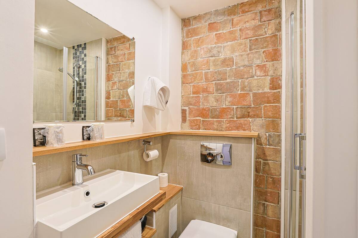 comfort double room | bathroom | hair dryer, towels